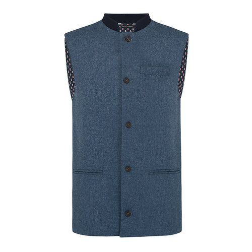 Nehru Gilet Made in England from Blue British Lambswool and a contrast Nehru collar in navy wool. Known as Nehru Vest, Nehru Waistcoat, Nehru Gilet. Finished with horn buttons. British designer, British menswear, Made in England. Smart casual Menswear.