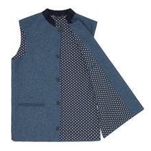 Nehru Gilet Made in England from Blue British Lambswool and a contrast Nehru collar in navy wool. Known as Nehru Vest, Nehru Waistcoat, Nehru Gilet. Finished with horn buttons. British designer, British menswear, Made in England. Smart casual Menswear.