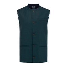 Nehru Gilet Made in England from Green Lambswool and a contrast Nehru collar in navy velvet. Known as Nehru Vest, Nehru Waistcoat, Nehru Gilet. Finished with horn buttons. British designer, British menswear, Made in England. Smart casual Menswear.
