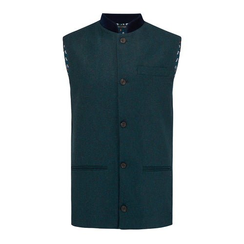Nehru Gilet Made in England from Green Lambswool and a contrast Nehru collar in navy velvet. Known as Nehru Vest, Nehru Waistcoat, Nehru Gilet. Finished with horn buttons. British designer, British menswear, Made in England. Smart casual Menswear.