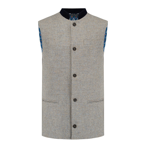 Nehru Gilet Made in England from Pale Grey British Lambswool and a contrast Nehru collar in navy wool. Known as Nehru Vest, Nehru Waistcoat, Nehru Gilet. Finished with horn buttons. British designer, British menswear, Made in England. Smart casual Menswear.