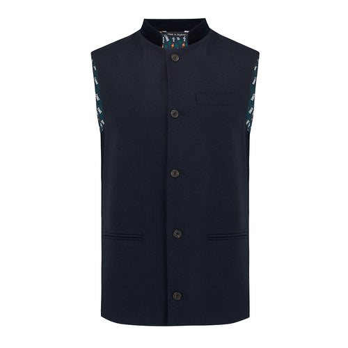 Nehru Gilet Made in England from Navy British Lambswool and a contrast Nehru collar in navy velvet. Known as Nehru Vest, Nehru Waistcoat, Nehru Gilet. Finished with horn buttons. British designer, British menswear, Made in England. Smart casual Menswear.
