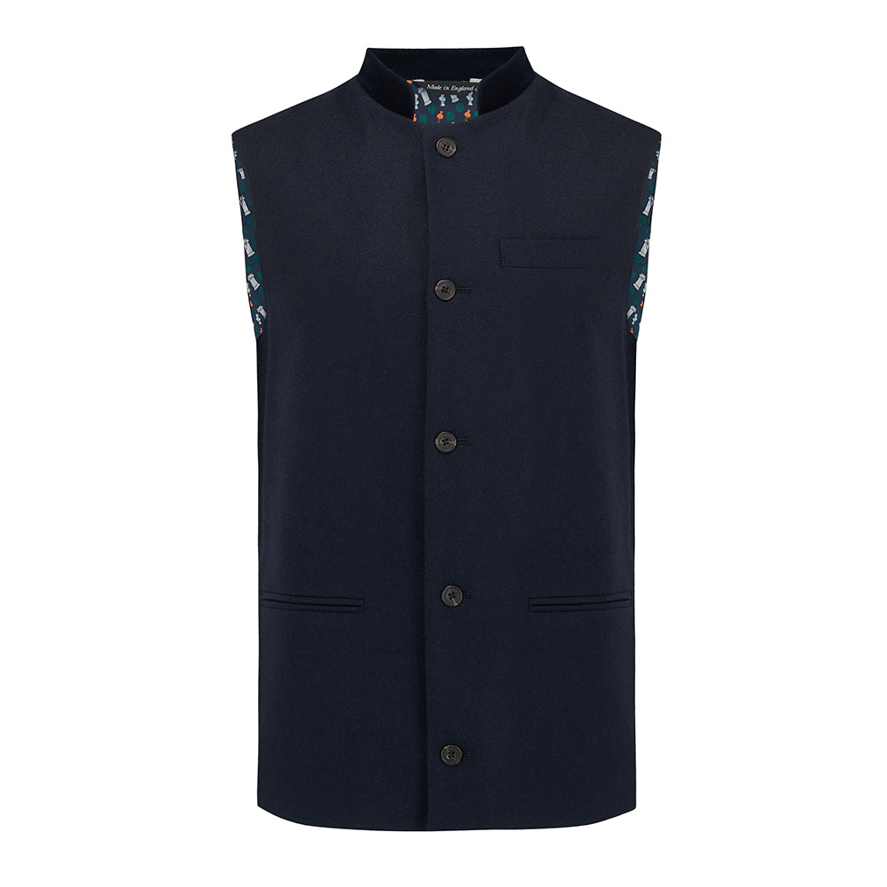 Nehru Gilet Made in England from Navy British Lambswool and a contrast Nehru collar in navy velvet. Known as Nehru Vest, Nehru Waistcoat, Nehru Gilet. Finished with horn buttons. British designer, British menswear, Made in England. Smart casual Menswear.