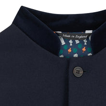 Nehru Gilet Made in England from Navy British Lambswool and a contrast Nehru collar in navy velvet. Known as Nehru Vest, Nehru Waistcoat, Nehru Gilet. Finished with horn buttons. British designer, British menswear, Made in England. Smart casual Menswear.