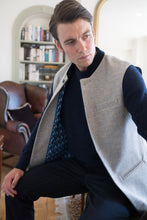 Nehru Gilet Made in England from Pale Grey British Lambswool and a contrast Nehru collar in navy wool. Known as Nehru Vest, Nehru Waistcoat, Nehru Gilet. Finished with horn buttons. British designer, British menswear, Made in England. Smart casual Menswear. 