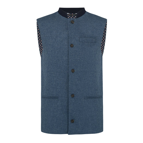 Nehru Gilet Made in England from Blue British Lambswool and a contrast Nehru collar in navy wool. Known as Nehru Vest, Nehru Waistcoat, Nehru Gilet. Finished with horn buttons. British designer, British menswear, Made in England. Smart casual Menswear. 