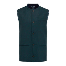 Nehru Gilet Made in England from Green Lambswool and a contrast Nehru collar in navy velvet. Known as Nehru Vest, Nehru Waistcoat, Nehru Gilet. Finished with horn buttons. British designer, British menswear, Made in England. Smart casual Menswear. 