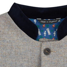 Nehru Gilet Made in England from Pale Grey British Lambswool and a contrast Nehru collar in navy wool. Known as Nehru Vest, Nehru Waistcoat, Nehru Gilet. Finished with horn buttons. British designer, British menswear, Made in England. Smart casual Menswear. 
