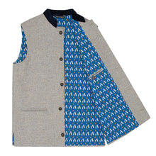 Nehru Gilet Made in England from Pale Grey British Lambswool and a contrast Nehru collar in navy wool. Known as Nehru Vest, Nehru Waistcoat, Nehru Gilet. Finished with horn buttons. British designer, British menswear, Made in England. Smart casual Menswear. 