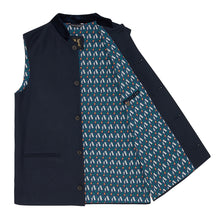 Nehru Gilet Made in England from Navy British Lambswool and a contrast Nehru collar in navy velvet. Known as Nehru Vest, Nehru Waistcoat, Nehru Gilet. Finished with horn buttons. British designer, British menswear, Made in England. Smart casual Menswear. 
